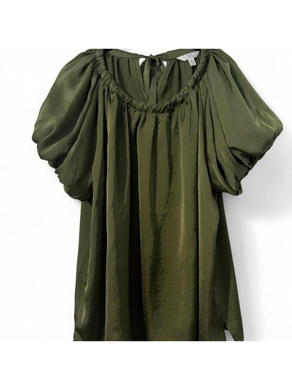 Green off the shoulder blouse with back tie detail. Small snag shown in front